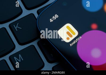 Google Analytics app is seen on an iPhone. Google Analytics is a service that tracks and reports website traffic, as a part of Google Marketing Platform. Stock Photo