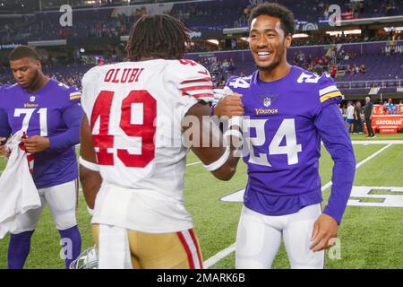 San Francisco 49ers linebacker Segun Olubi (49) looks on during