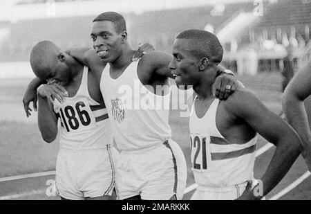 https://l450v.alamy.com/450v/2markkk/bob-hayes-center-of-florida-am-puts-his-arms-around-two-of-his-competitors-after-winning-the-100-yard-dash-in-a-record-time-of-91-seconds-for-the-second-time-at-the-national-aau-track-and-field-meet-in-st-louis-mo-june-21-1963-his-record-time-in-the-earlier-semifinals-will-stand-the-second-race-the-final-was-not-allowed-because-of-a-strong-wind-with-hayes-are-two-southern-california-runners-john-gilbert-right-who-was-second-and-willie-williams-who-was-fourth-ap-photo-2markkk.jpg