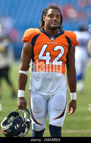 Arizona Cardinals running back Corey Clement, left, runs against Denver  Broncos linebacker Nik Bonitto during the first half of an NFL preseason  football game in Glendale, Ariz., Friday, Aug. 11, 2023. (AP