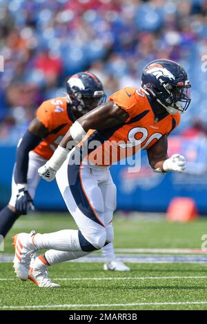 Denver Broncos linebacker Jonathan Kongbo (90) walks off the field after an  NFL football game against the Jacksonville Jaguars at Wembley Stadium in  London, Sunday, Oct. 30, 2022. The Denver Broncos defeated