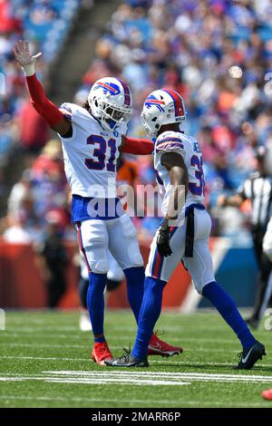 Chicago, United States. 24th Dec, 2022. Buffalo Bills safety Damar Hamlin  (3) celebrates a fumble recovery by teammate Tim Settle during the Bills  35-13 Christmas Eve win over the Chicago Bears at