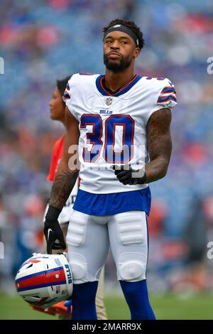 Buffalo Bills cornerback Dane Jackson (30) breaks up a pass intended for  Cincinnati Bengals wide receiver Ja'Marr Chase (1) during the first quarter  of an NFL division round football game, Sunday, Jan.