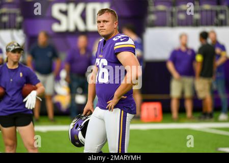 Miami Dolphins punter Thomas Morstead, left and Minnesota Vikings punter  Ryan Wright, right, trade jerseys after an NFL football game, Sunday, Oct.  16, 2022, in Miami Gardens, Fla. (AP Photo/Wilfredo Lee Stock