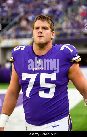 Minnesota Vikings tackle Brian O'Neill arrives for practice during the  first day of training camp as rookies, free agents and some veterans  reported to the NFL football team complex Wednesday, July 25