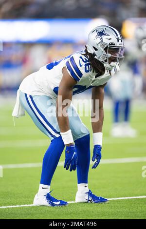 Dallas Cowboys cornerback Isaac Taylor-Stuart runs with the ball