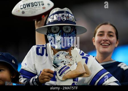 A Dallas Cowboys fan wears a costume during the first half of an NFL  football game against the Chicago Bears Sunday, Oct. 30, 2022, in  Arlington, Texas. (AP Photo/Ron Jenkins Stock Photo 