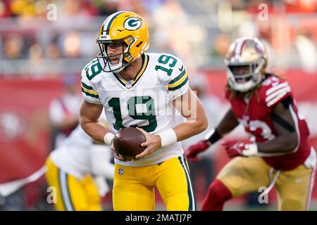 Green Bay Packers quarterback Danny Etling (19) throws a pass during an NFL  pre-season football game against the Kansas City Chiefs Thursday, Aug. 25,  2022, in Kansas City, Mo. (AP Photo/Peter Aiken