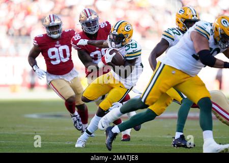 Green Bay Packers' Tyler Goodson runs during the first half of a preseason  NFL football game against the New Orleans Saints Friday, Aug. 19, 2022, in  Green Bay, Wis. (AP Photo/Morry Gash