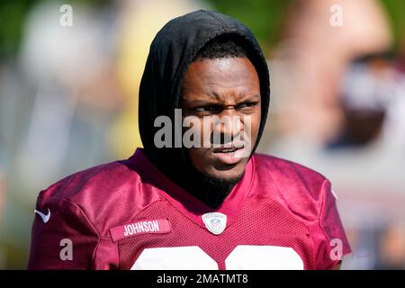 Washington Commanders cornerback Danny Johnson catches the ball