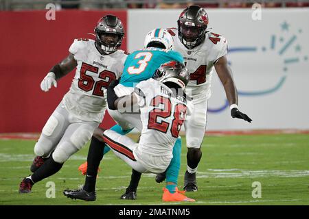 Tampa Bay Buccaneers cornerback Rashard Robinson (28) and Ross Cockrell  (43) walks off the field after an NFL football game against the New York  Jets, Sunday, Jan. 2, 2022, in East Rutherford