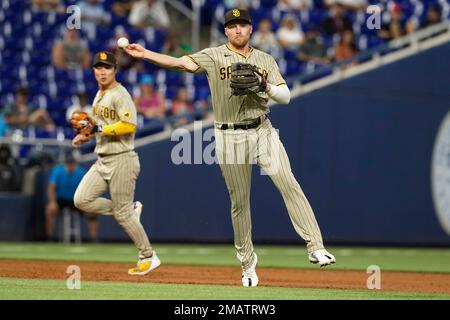 May 05, 2022: San Diego Padres second baseman Jake Cronenworth (9) avoids a  pitch during a MLB baseball game between the Miami Marlins and the San  Diego Padres at Petco Park in