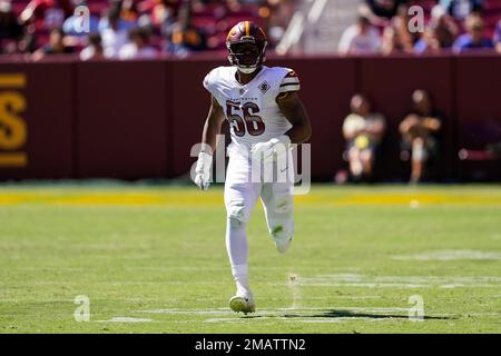 Washington Commanders defensive end Will Bradley-King (56) walks on the  field after a preseason NFL football game against the Carolina Panthers,  Saturday, Aug. 13, 2022, in Landover, Md. The Panthers won 23-21. (