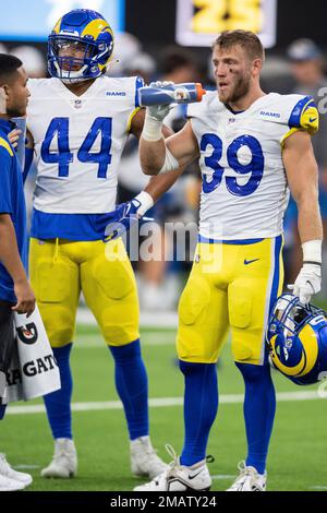 Los Angeles Rams linebacker Daniel Hardy (44) and safety Jake Gervase (39)  drinks from a Gatorade bottle with his helmet off while playing the Los  Angeles Chargers during an NFL preseason Football