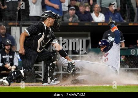 Chicago White Sox catcher Seby Zavala (44) and relief pitcher Vince  Velasquez (23) celebrate the team's 14-2 victory against the Oakland  Athletics in a baseball game in Oakland, Calif., Thursday, Sept. 8