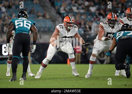 Cleveland Browns offensive tackle Ben Petrula (67) and center Brock Hoffman  (57) block during the second half of a preseason NFL football game against  the Jacksonville Jaguars, Friday, Aug. 12, 2022, in