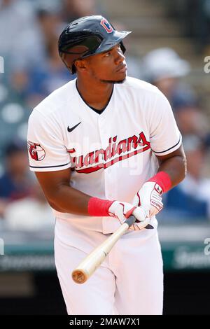 Cleveland Guardians' Oscar Gonzalez watches his ground out with