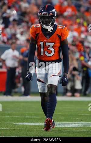 Denver Broncos cornerback Michael Ojemudia (13) runs a play against the  Dallas Cowboys in the first half of an NFL football game Saturday, Aug 13,  2022, in Denver. (AP Photo/Bart Young Stock