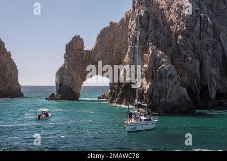 The Cabo Arch is perhaps the most famous landmark in Cabo San Lucas, Mexican Riviera, Mexico. It is only reachable via boat and sits at Land's End. Stock Photo