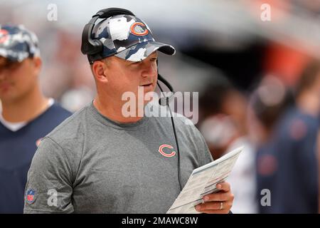 Chicago Bears offensive coordinator Luke G , left, talks to Chicago  Bears 2023 draft pick, defensive lineman Zacch Pickens during the NFL  football team's rookie minicamp at Halas Hall in Lake Forest, Ill.,  Saturday, May 6, 2023. (AP Photo/Nam Y. Huh