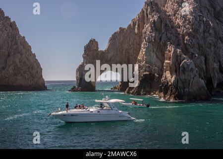 The Cabo Arch is perhaps the most famous landmark in Cabo San Lucas, Mexican Riviera, Mexico. It is only reachable via boat and sits at Land's End. Stock Photo