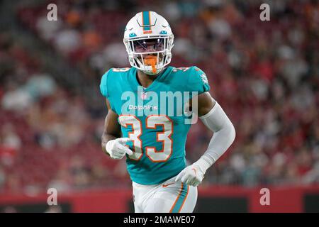 Miami Dolphins cornerback Elijah Hamilton (33) follows a play