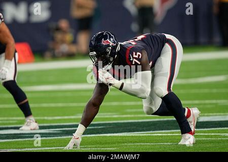 Houston Texans defensive end Adedayo Odeleye (75) walks toward the huddle  during the second half of an NFL preseason football game against the New  Orleans Saints Saturday, Aug. 13, 2022, in Houston. (