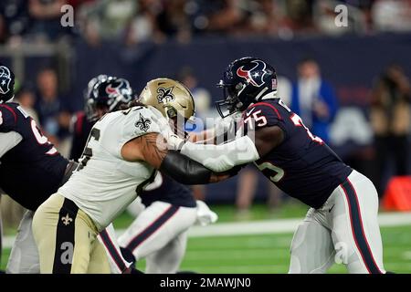 Houston Texans defensive end Adedayo Odeleye (75) walks toward the huddle  during the second half of an NFL preseason football game against the New  Orleans Saints Saturday, Aug. 13, 2022, in Houston. (