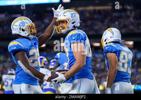 Los Angeles Chargers tight end Hunter Kampmoyer (87) celebrates his  two-point conversion with running back Isaiah Spiller (28) during the  second half of a preseason NFL football game against the Los Angeles Rams  Saturday, Aug. 13, 2022, in Inglewood