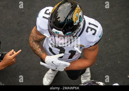 Jacksonville Jaguars defensive back Shabari Davis is tackled by Las Vegas  Raiders defensive end Tashawn Bower during the second half of the NFL  football exhibition Hall of Fame Game, Thursday, Aug. 4