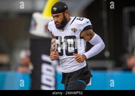 Jacksonville Jaguars wide receiver Jeff Cotton Jr. (88) is tackled by  Pittsburgh Steelers cornerback Linden Stephens (40) and cornerback Carlins  Platel (30) after catching a pass during the second half of a