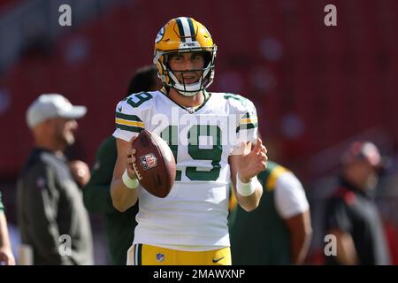 Green Bay Packers quarterback Danny Etling (19) runs for a touchdown during  an NFL Preseason game against the New Orleans Saints Friday, Aug. 19, 2022,  in Green Bay, Wis. (AP Photo/Jeffrey Phelps