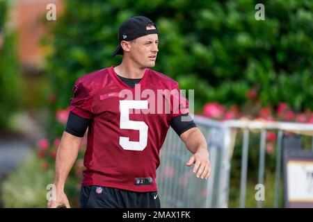 Washington Commanders punter Tress Way (5) makes his way to the field  before practice at the team's NFL football training facility, Tuesday, Aug.  2, 2022 in Ashburn, Va. (AP Photo/Nick Wass Stock