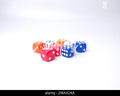 Colored dice isolated on a white background Stock Photo
