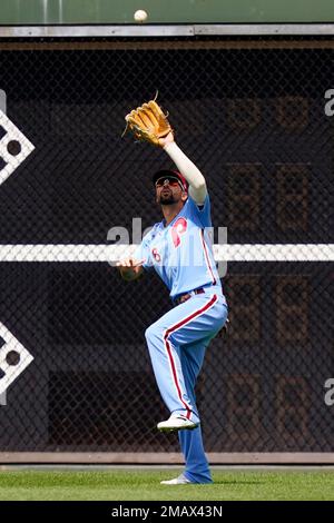 Miami Marlins' Peyton Burdick, right, high-fives Jordan Groshans