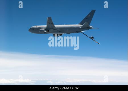 A KC-46A Pegasus assigned to the 916th Air Refueling Wing at Seymour Johnson Air Force Base, North Carolina, flies over North Carolina, June 6, 2022. The KC-46 is equipped with a refueling boom that is driven by a fly-by-wire control system which is able to refuel most fixed-wing, receiver-capable aircraft. Stock Photo