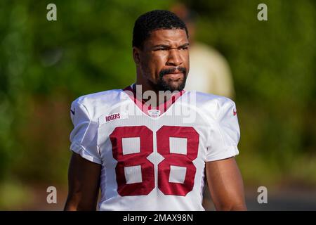 Washington Commanders tight end Armani Rogers (88) wears Crucial