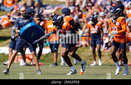 Denver Broncos wide receiver Brandon Johnson (89) is covered by Buffalo  Bills cornerback Kaiir Elam (24) during the first half of a preseason NFL  football game in Orchard Park, N.Y., Saturday, Aug.