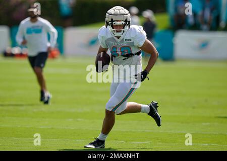 Miami Dolphins tight end Tanner Conner (80) covers a kick during an NFL  football game against the Buffalo Bills, Sunday, Sept. 25, 2022 in Miami  Gardens, Fla. The Dolphins defeat the Bills