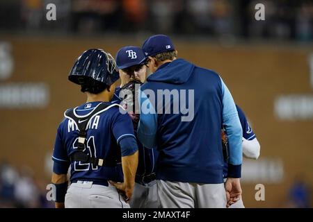 Tampa Bay Rays pitching coach Kyle Snyder, left, looks on as Shane