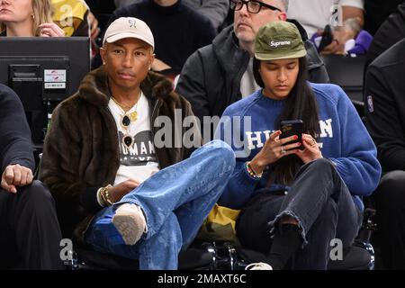 Pharrell Williams and his wife Helen Lasichanh attend the NBA Paris Game  2023 match between Detroit Pistons and Chicago Bulls at AccorHotels Arena  on January 19, 2023 in Paris, France. Photo by