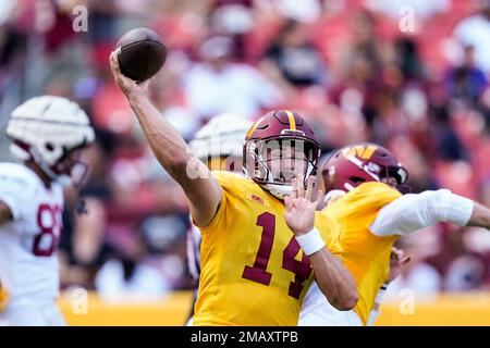 Washington Commanders quarterback Sam Howell (14) throws the ball during  the second half of a NFL preseason football game against the Baltimore  Ravens, Saturday, Aug 27, 2022, in Baltimore. (AP Photo/Terrance Williams