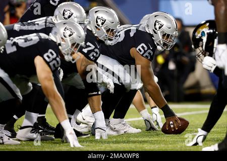 Thousand Oaks, United States. 18th Aug, 2021. Las Vegas Raiders guard  Richie Incognito (64) speaks to Los Angeles Rams vice president of  communications Artis Twyman during training camp on Wednesday, Aug 18