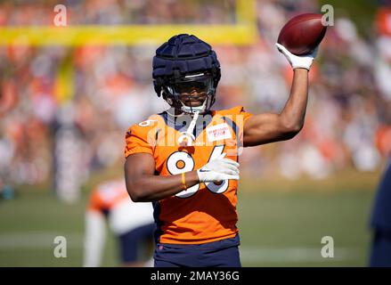 Denver Broncos running back Max Borghi (36) takes part in drills during the  NFL football team's training camp Friday, Aug. 5, 2022, at the Broncos'  headquarters in Centennial, Colo. (AP Photo/David Zalubowski