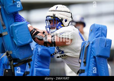 Los Angeles Rams linebacker Brayden Thomas (98) lines up for the play  during a preseason NFL football game against the Cincinnati Bengals,  Saturday, Aug. 27, 2022, in Cincinnati. (AP Photo/Emilee Chinn Stock