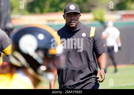 FILE - Pittsburgh Steelers senior defensive assistant Brian Flores, right, watches as the team goes through drills during an NFL football practice on May 31, 2022, in Pittsburgh. A judge on Thursday, Aug. 4, 2022, quickened the time it will take to rule whether NFL Commissioner Roger Goodell gets to decide the merits of racial discrimination claims made by Black coaches against the league and its teams, saying that it appears an effort to gather more evidence is a try at “an impermissible fishing expedition.” Flores, who was fired in January as head coach of the Miami Dolphins and is now with 