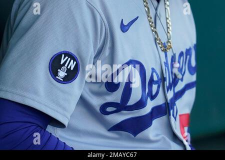 A patch honoring broadcaster Vin Scully is shown on the jersey of