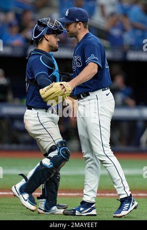 Tampa Bay Rays relief pitcher Jason Adam, right, celebrates with catcher  Rene Pinto after closing out the Toronto Blue Jays during a baseball game  Wednesday, Aug. 3, 2022, in St. Petersburg, Fla. (