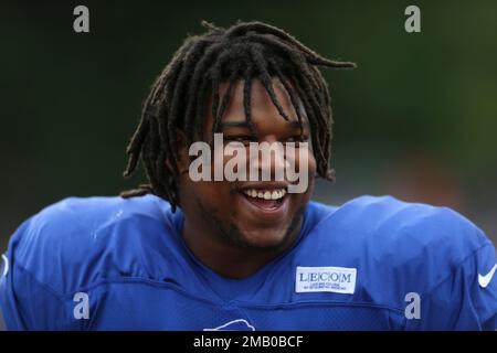 Buffalo Bills defensive tackle Tim Settle (99) prepares to walk