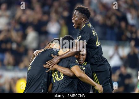 Los Angeles, United States. 04th Mar, 2023. Los Angeles FC forwards Kwadwo  Opoku (R) celebrates a goal with Carlos Vela (L) during an MLS soccer match  against the Portland Timbers in Los